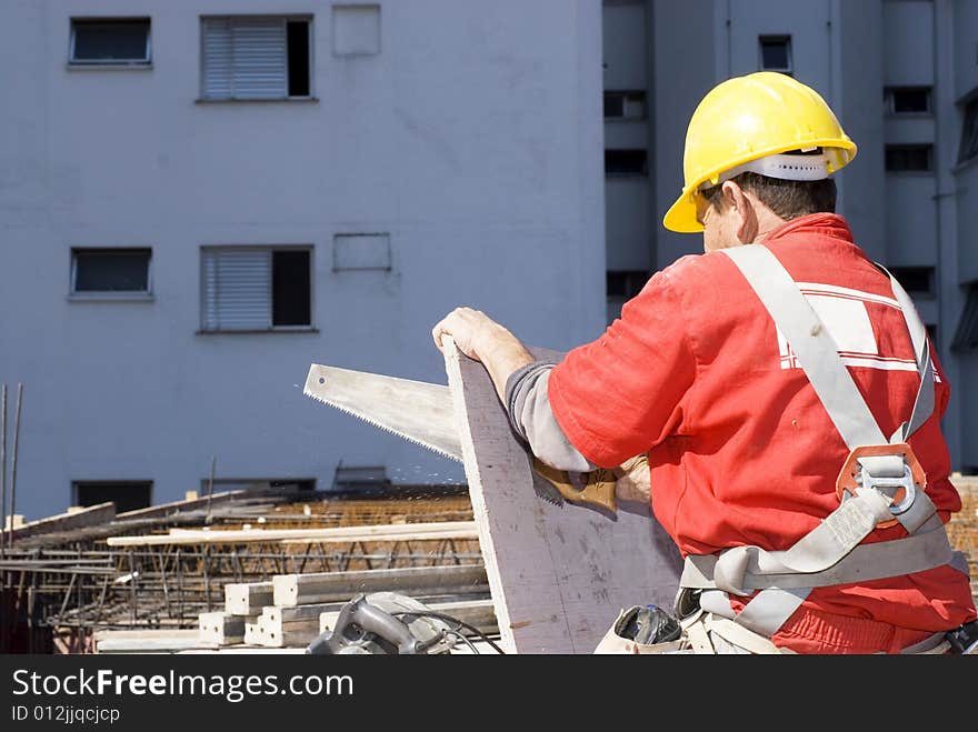 Construction Worker Saws Board - Horizontal