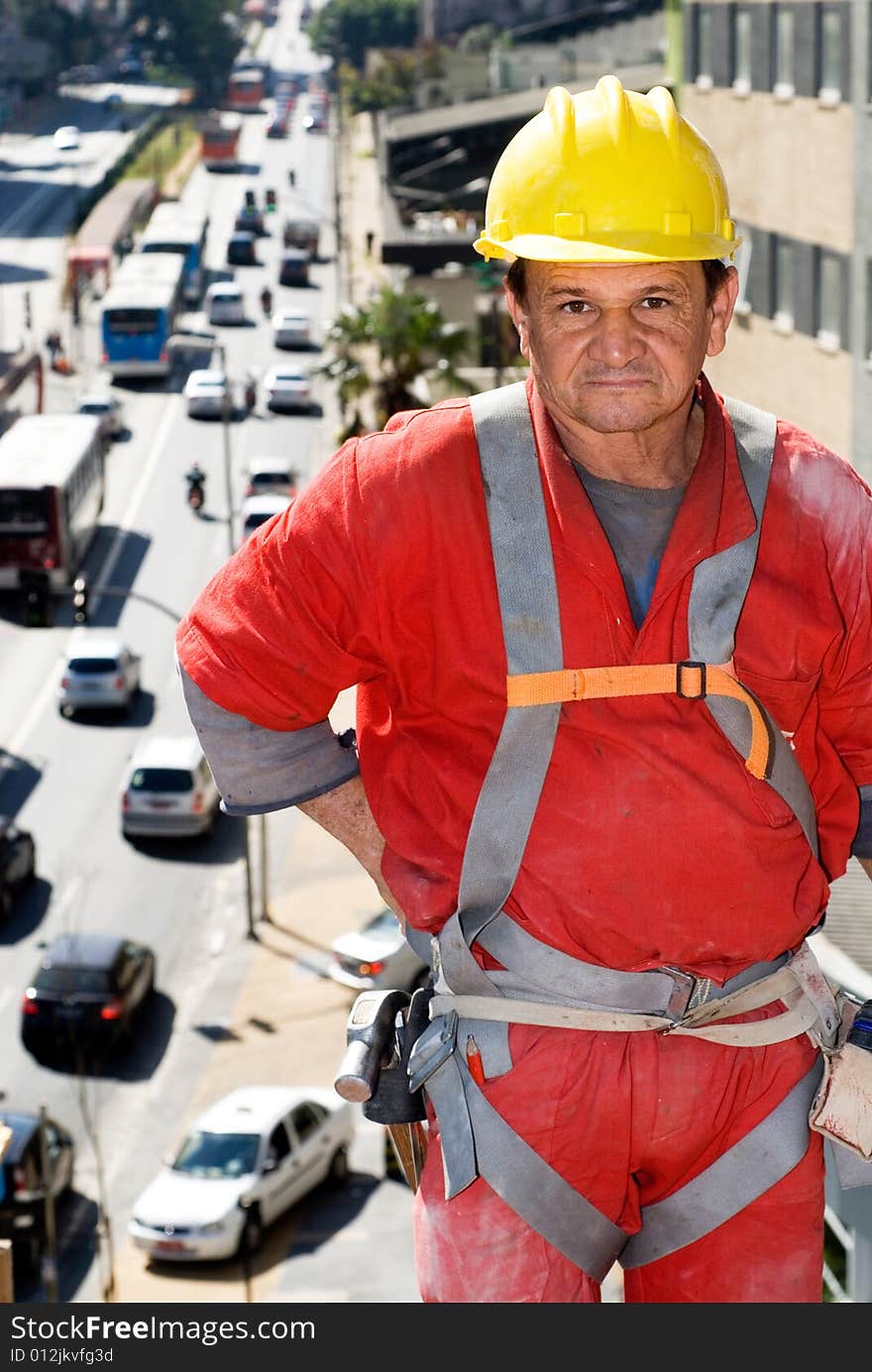 Worker Looks at Camera - Vertical