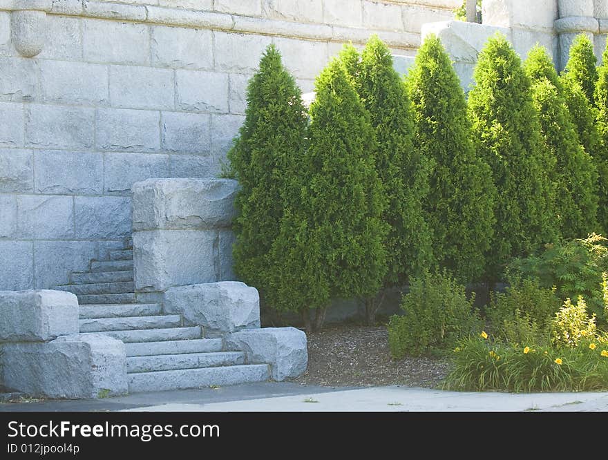 Stone stairs with green trees standing nearby. Stone stairs with green trees standing nearby.