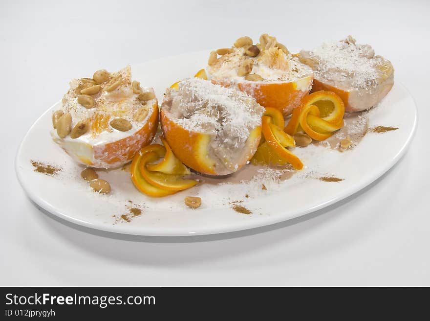 Desert from oranges and ice-cream