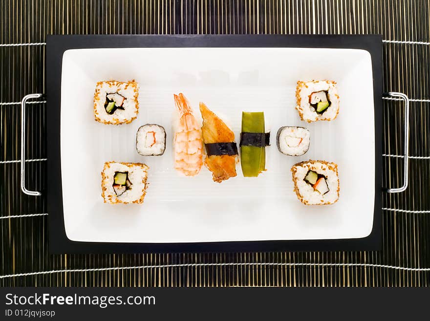 A plate with different kinds of sushi