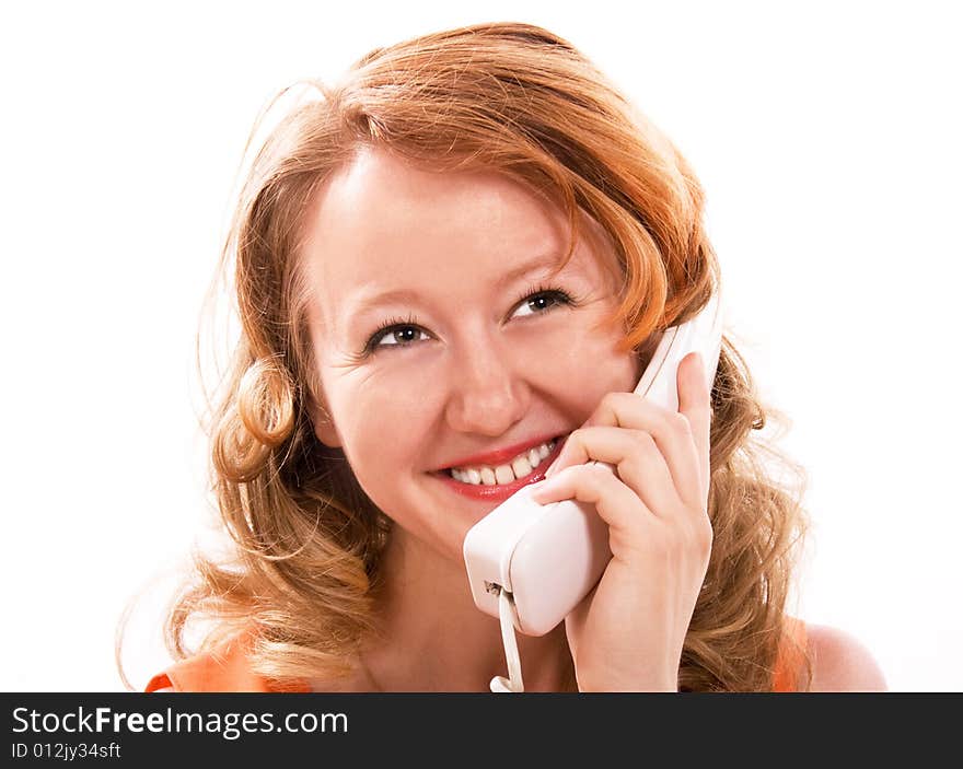 Pretty young girl talking on the phone