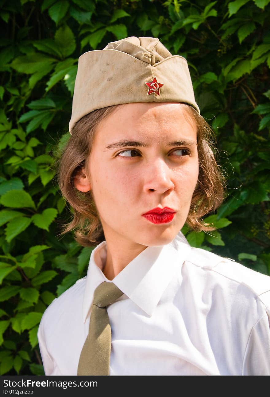 Beautiful girl wearing a soviet soldier cap