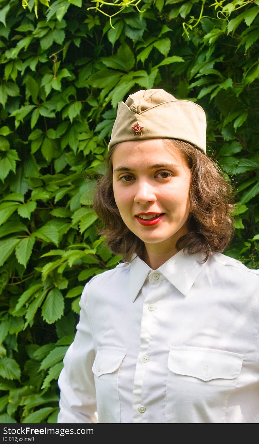 Beautiful girl wearing a soviet soldier cap