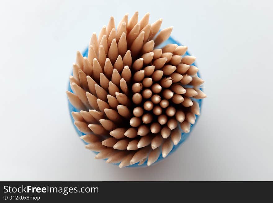 Isolated toothpicks on gray background