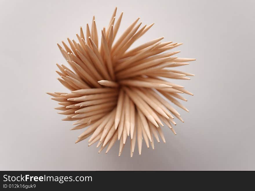 Isolated toothpicks on gray background