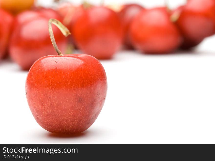 Fresh appetizing sweet cherry on a white background. Fresh appetizing sweet cherry on a white background