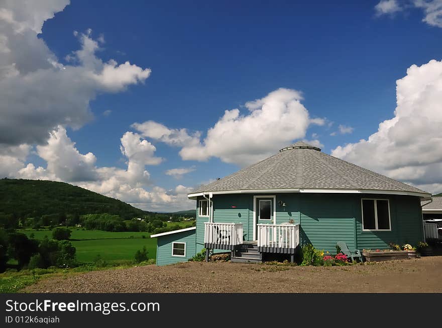 Round house overlooking river valley