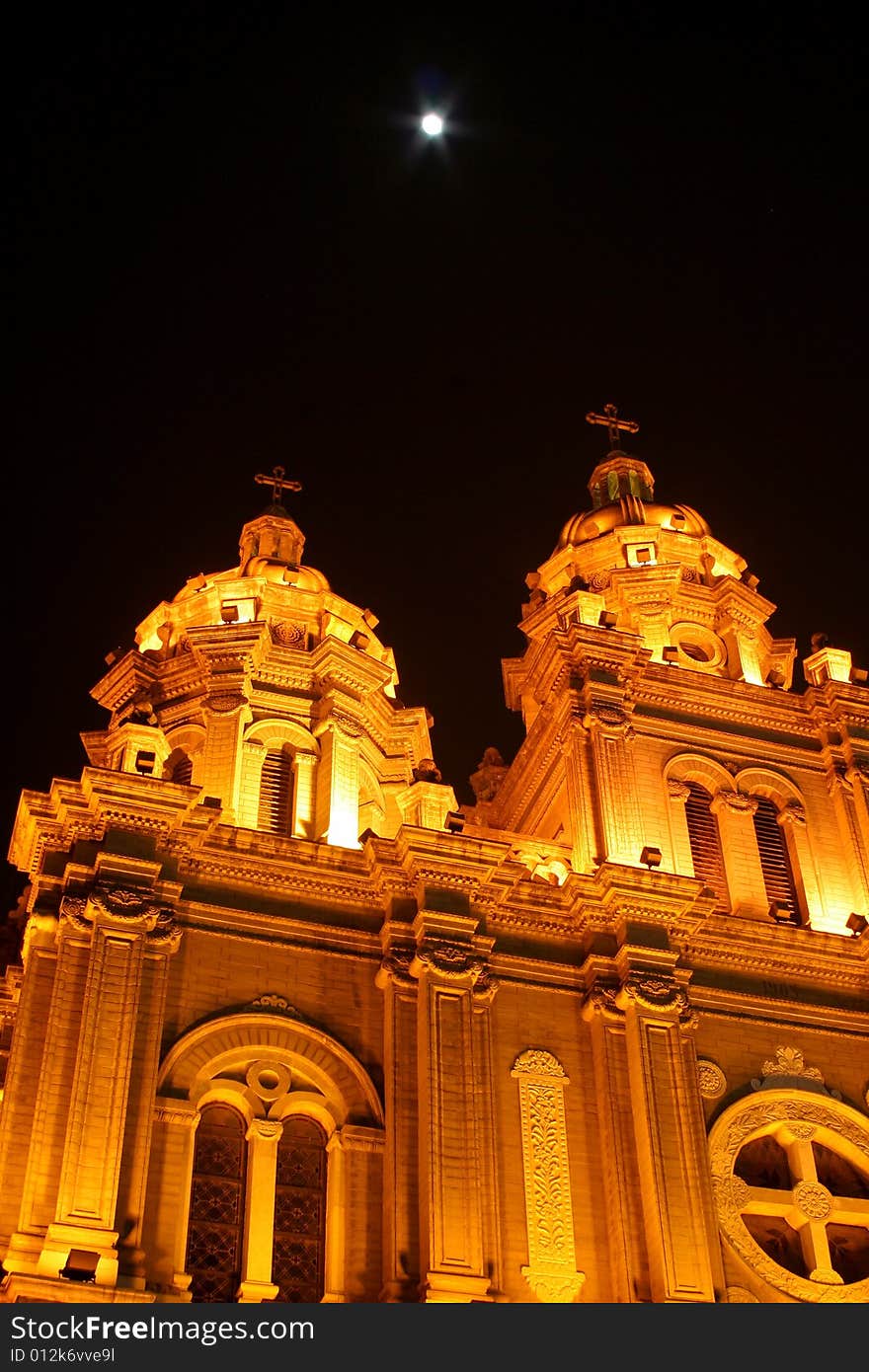 A Church in China with the moon in the night. A Church in China with the moon in the night