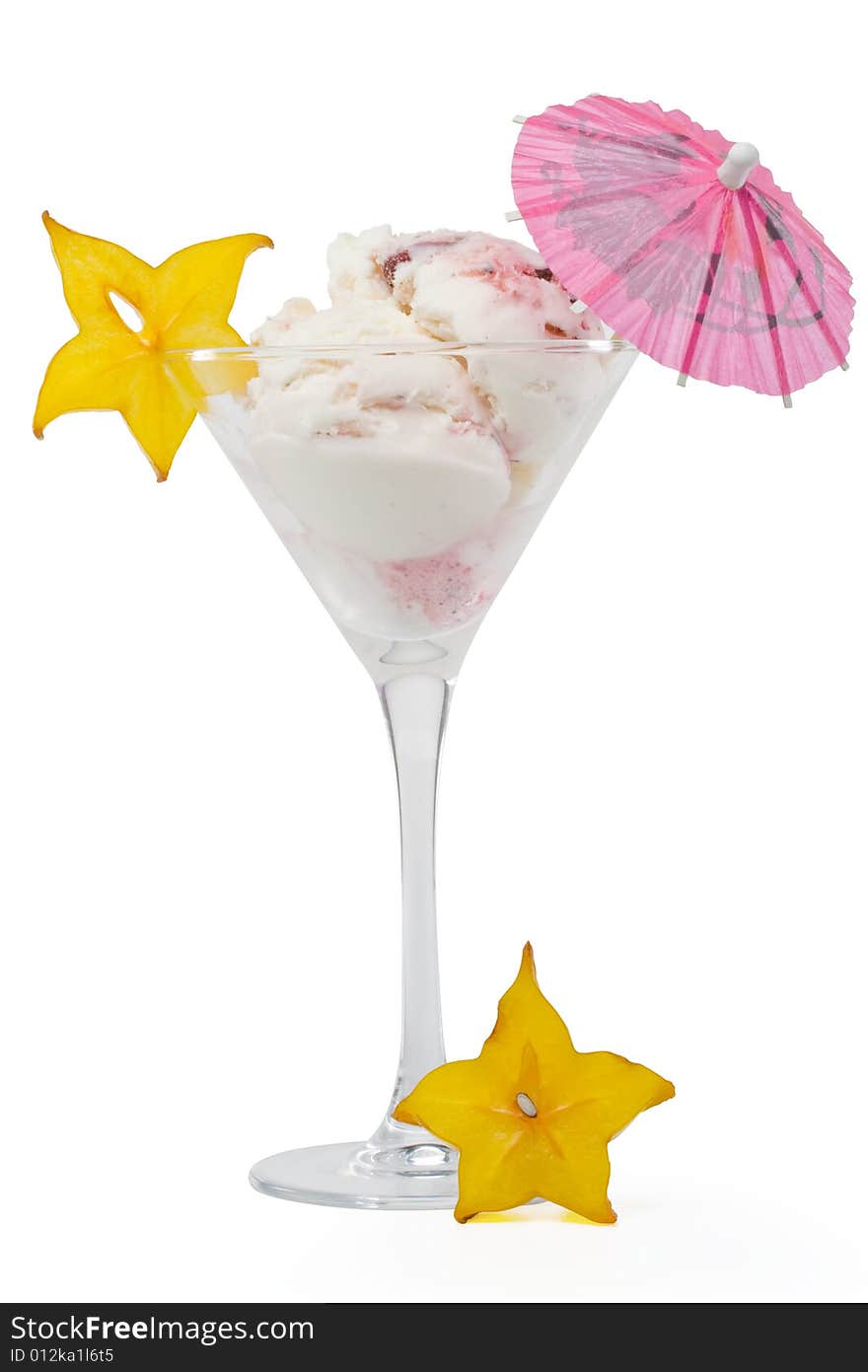 Ice-cream with slice of carambola in a glass on a white background. Ice-cream with slice of carambola in a glass on a white background.