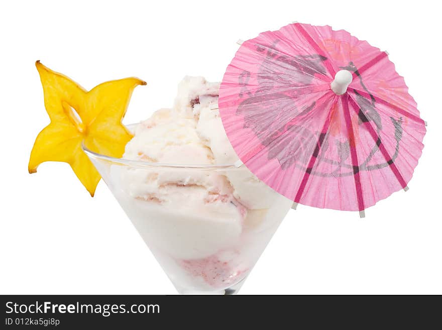 Ice-cream with slice of carambola in a glass on a white background. Ice-cream with slice of carambola in a glass on a white background.