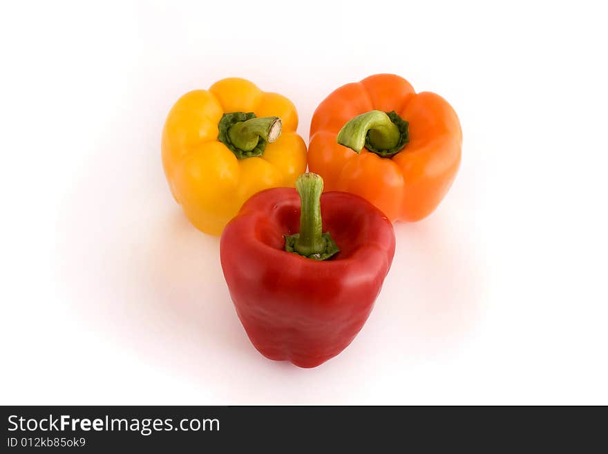 Red peppers on white background