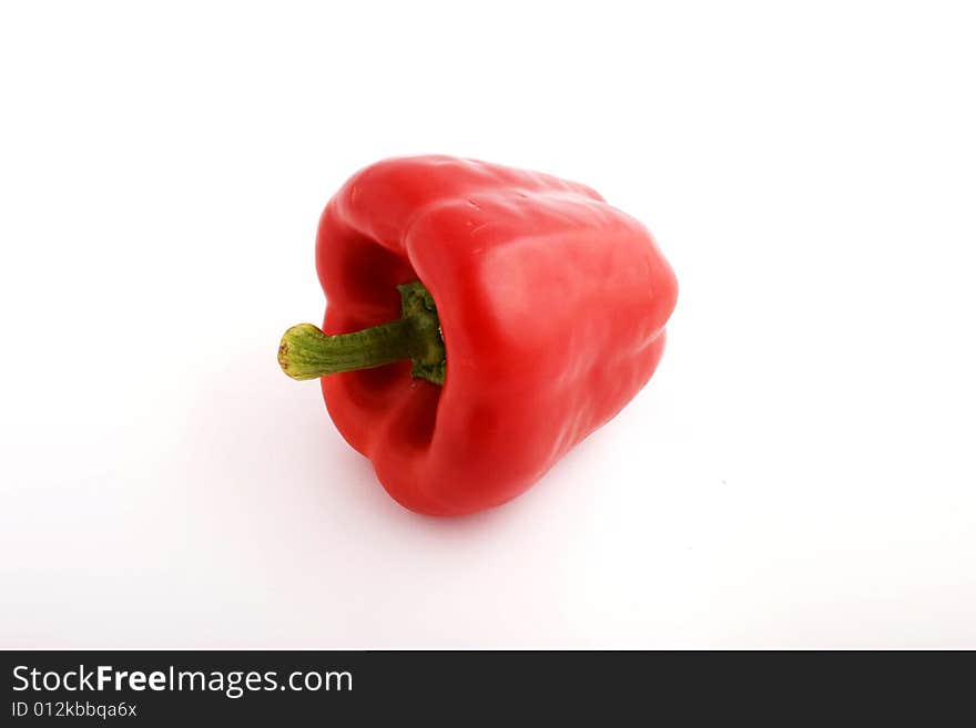 Red pepper on white background