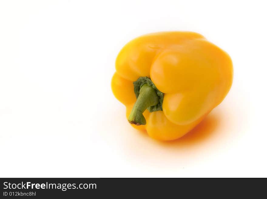 Yellow pepper on white