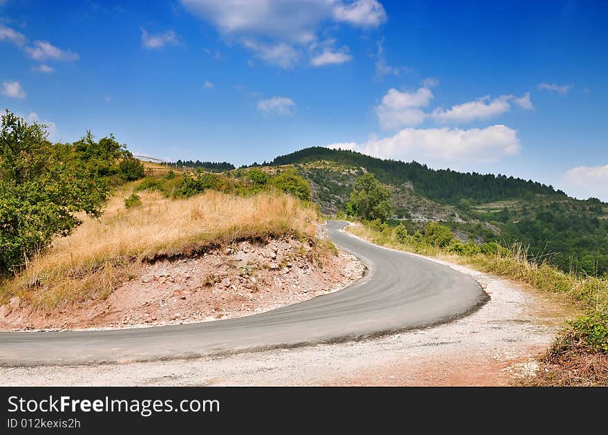 A mountain road with cloudy sky, Bulgaria