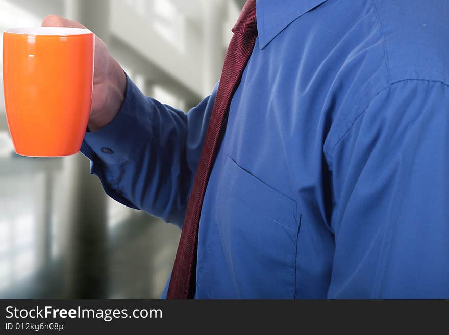 Men having a cup of coffee at work. Men having a cup of coffee at work