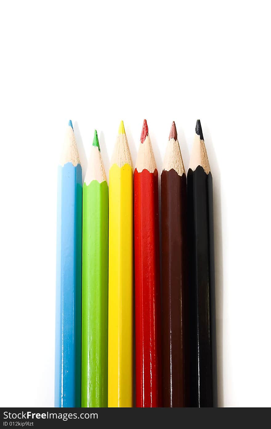 Colorful pencils on white background