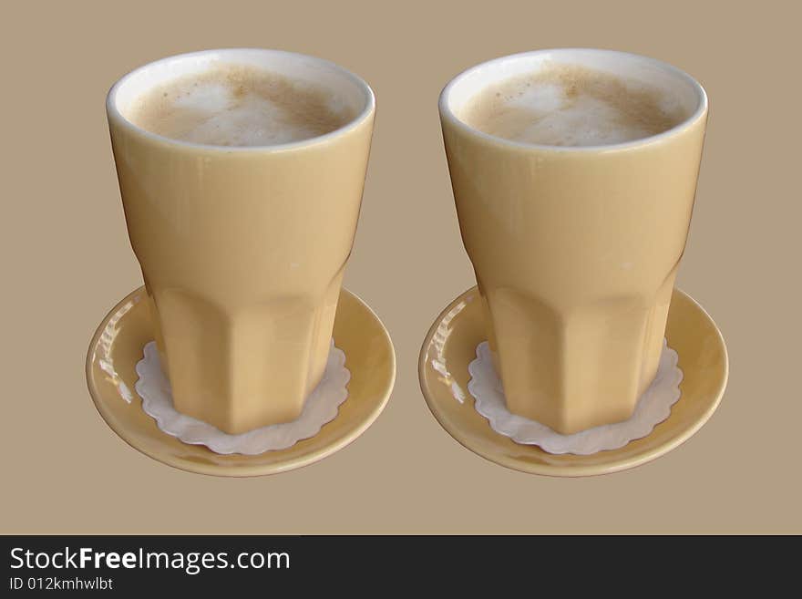 Two Delicious cafe latte isolated with a brown background. Two Delicious cafe latte isolated with a brown background