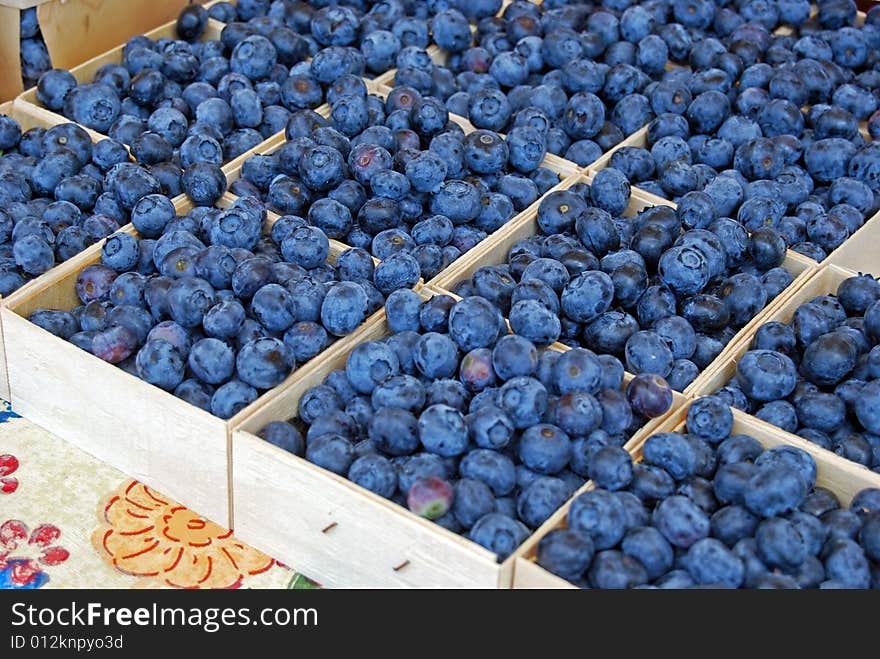 Fresh summer blueberries at the market. Fresh summer blueberries at the market.