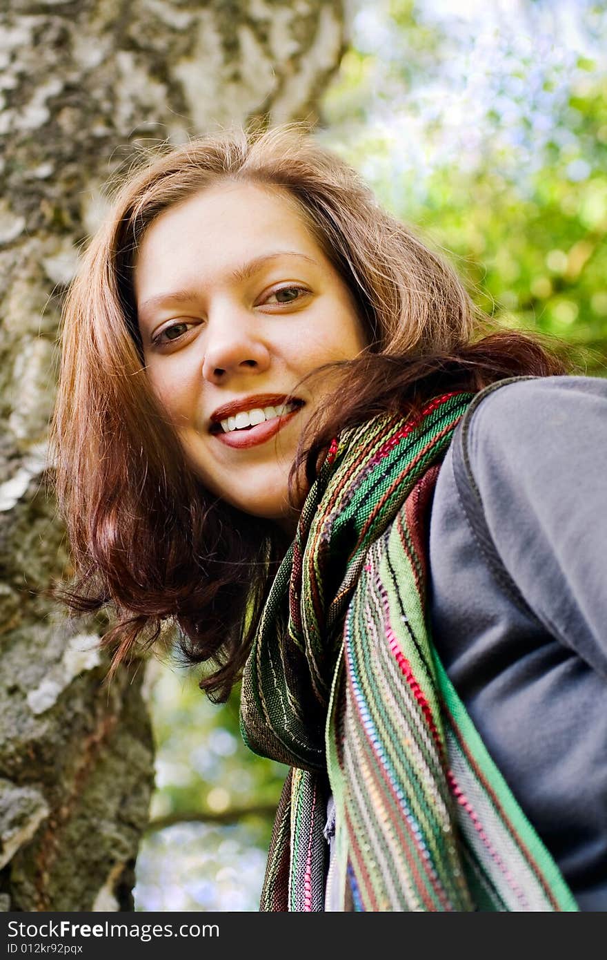 Young woman looking down by a walk in the nature. Young woman looking down by a walk in the nature