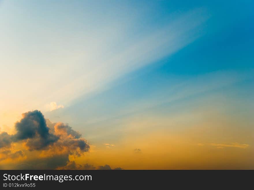 Cloud casting its shadow in the sky at sunset. Cloud casting its shadow in the sky at sunset