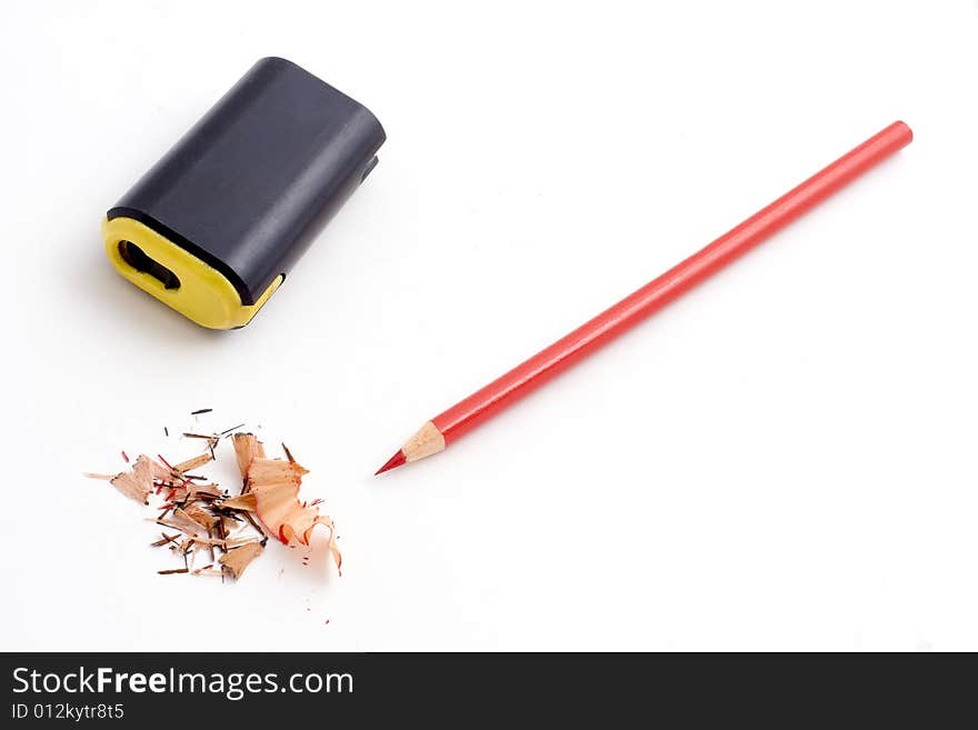 Colored pencil, sharpener, and shavings