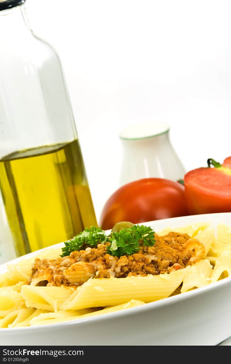 Spaghetti bolognese with parmesan cheese and olive