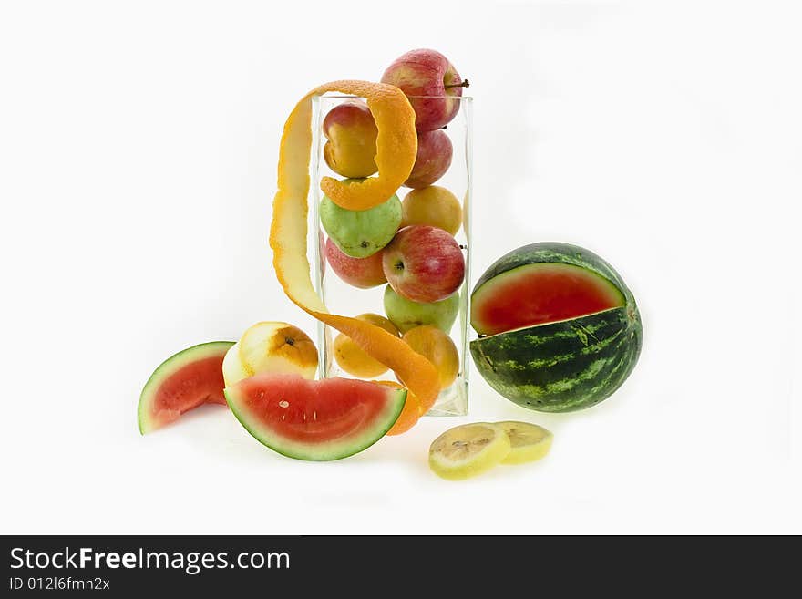 Composition - pomes and pears in a transparent glass vase. Composition - pomes and pears in a transparent glass vase