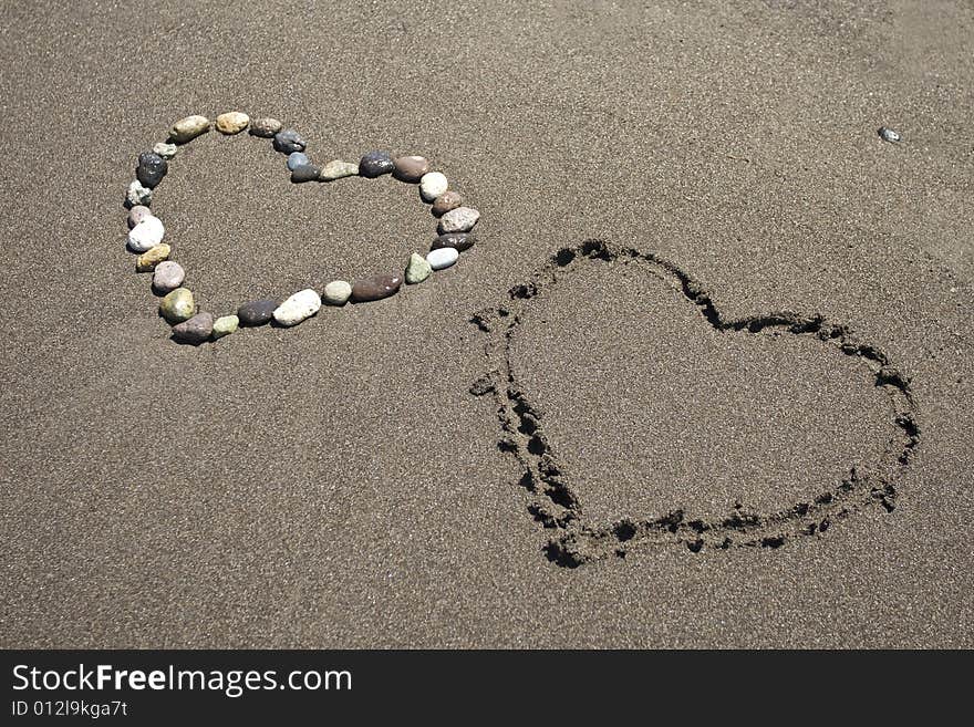 "love"in the sandy beach in Greece