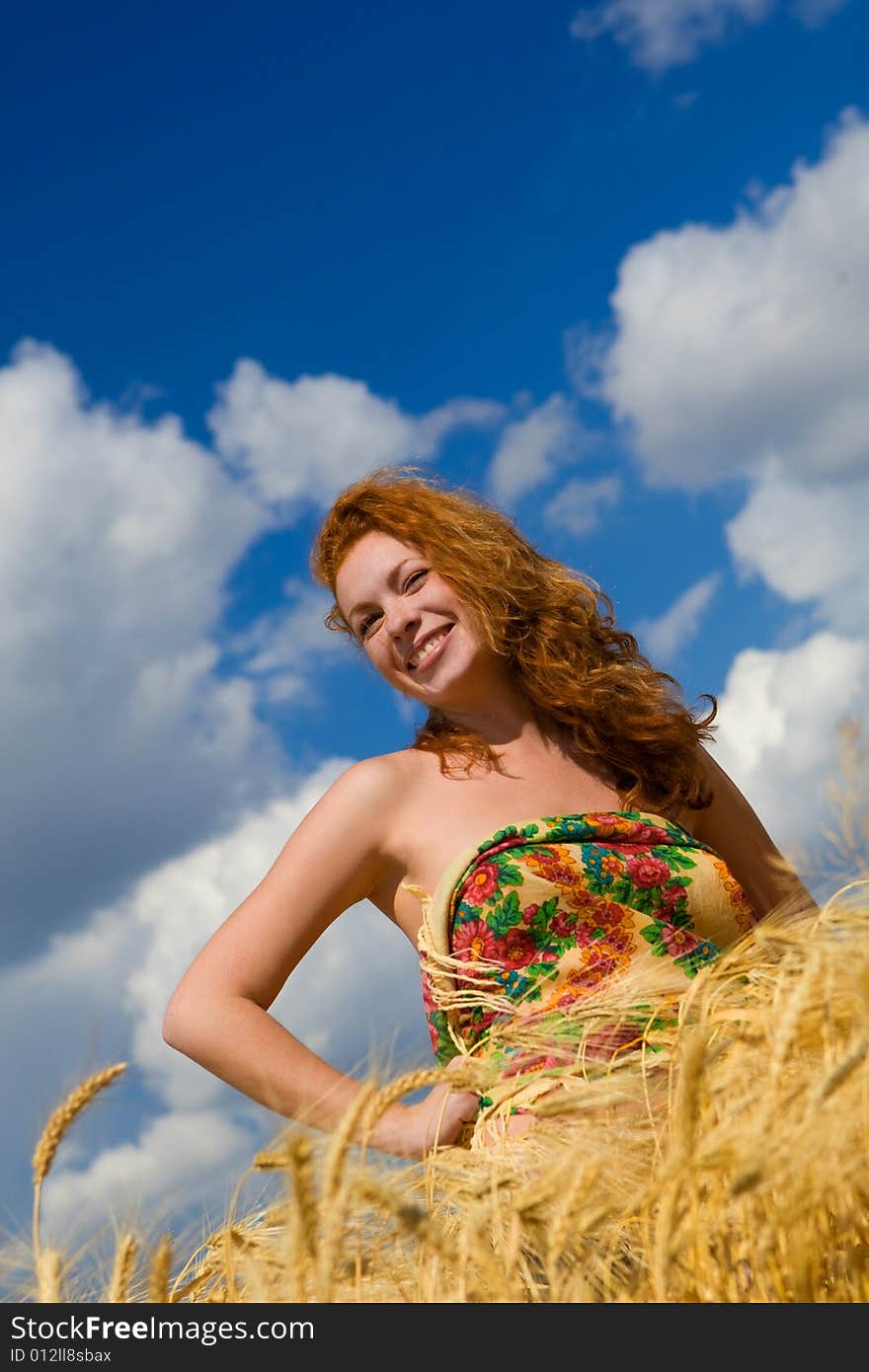 Beautiful caucasian model in golden wheat field. Beautiful caucasian model in golden wheat field