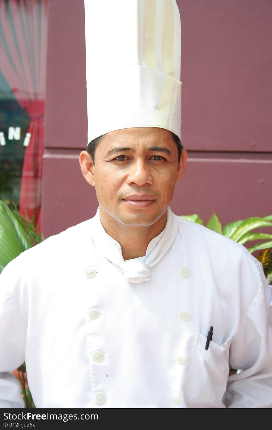 Photogrpah of asian chef in uniform