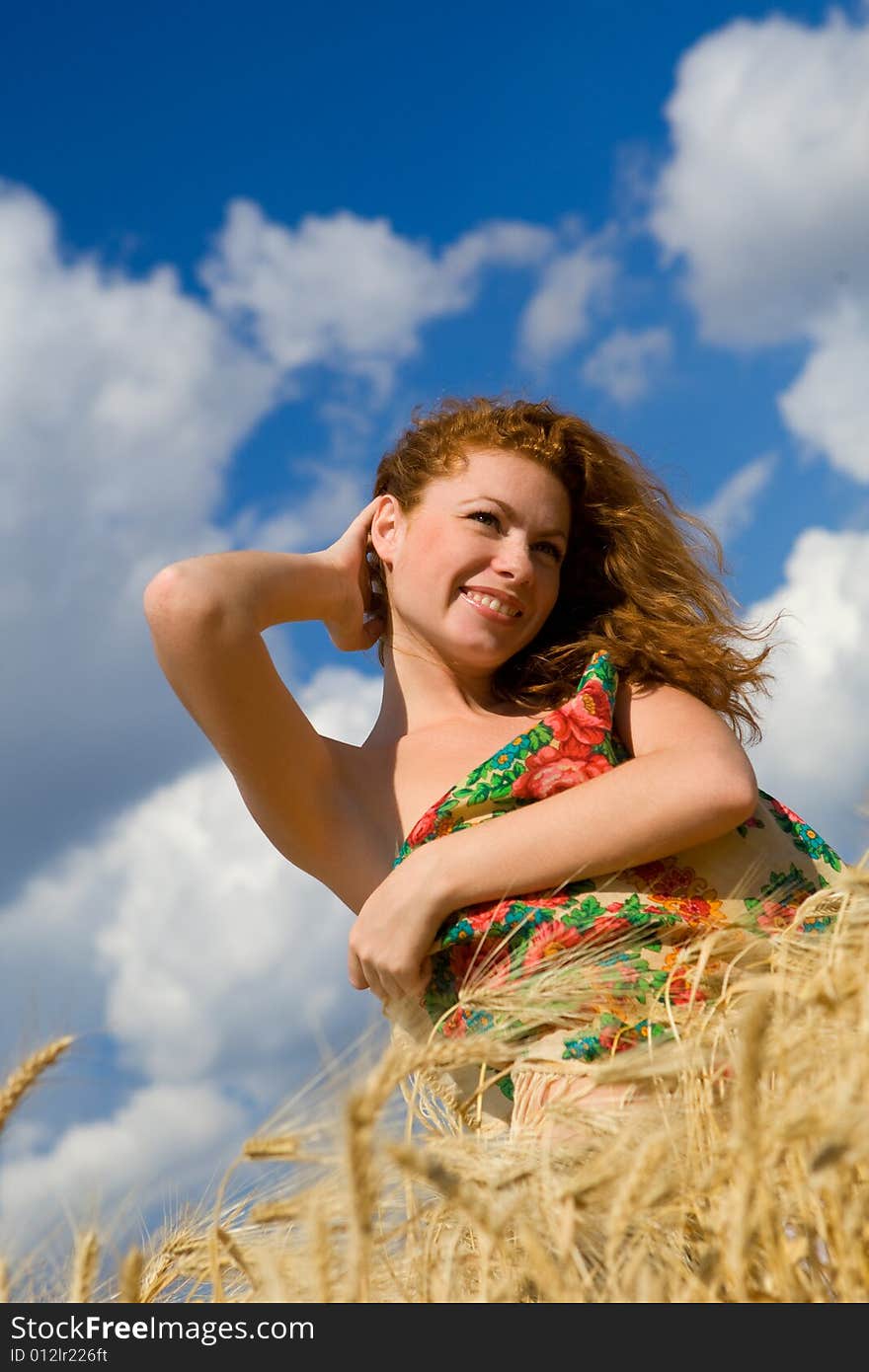 Beautiful Model In Golden Wheat Field