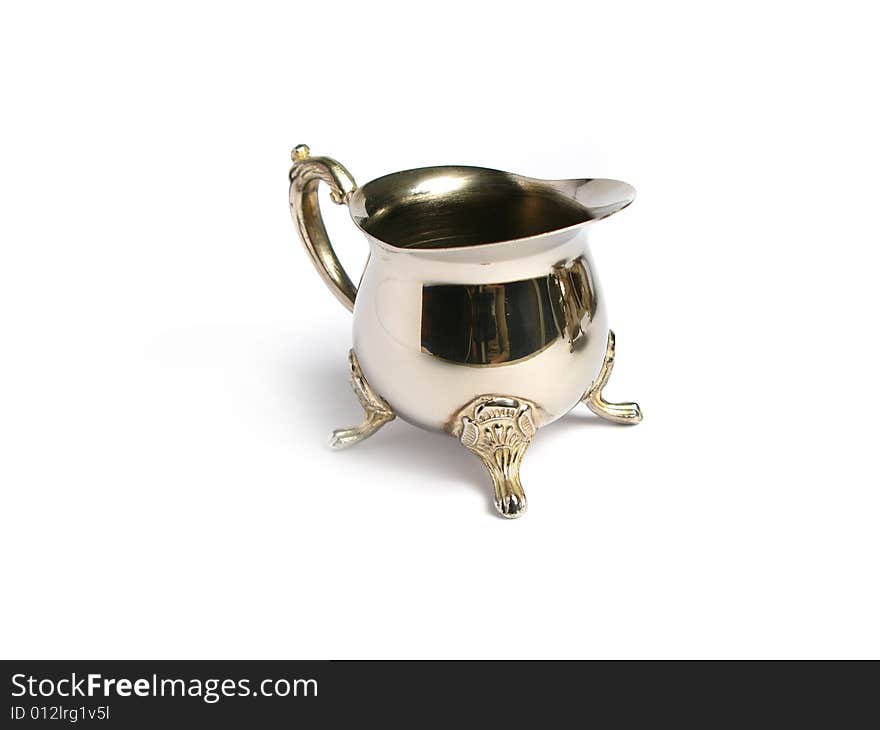 Silver chromed Milk cup on a white background