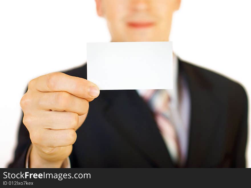 Young businessman holding blank card