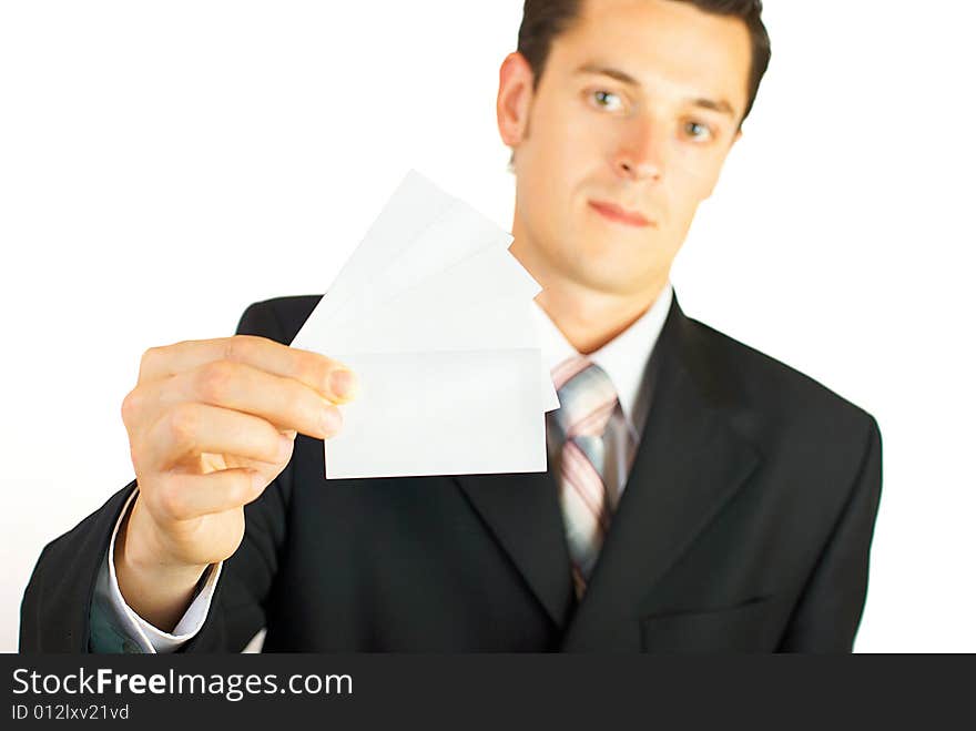 Young businessman holding blank visit card. Backside. Isolated. Young businessman holding blank visit card. Backside. Isolated.