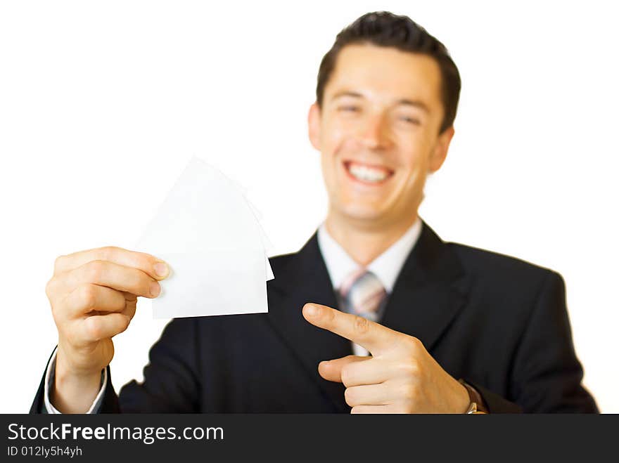 Young businessman holding blank visit card. Backside. Isolated. Young businessman holding blank visit card. Backside. Isolated.