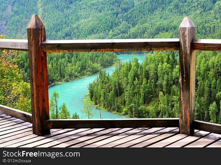 The road through the forest of Canus Water Sinkiang china .