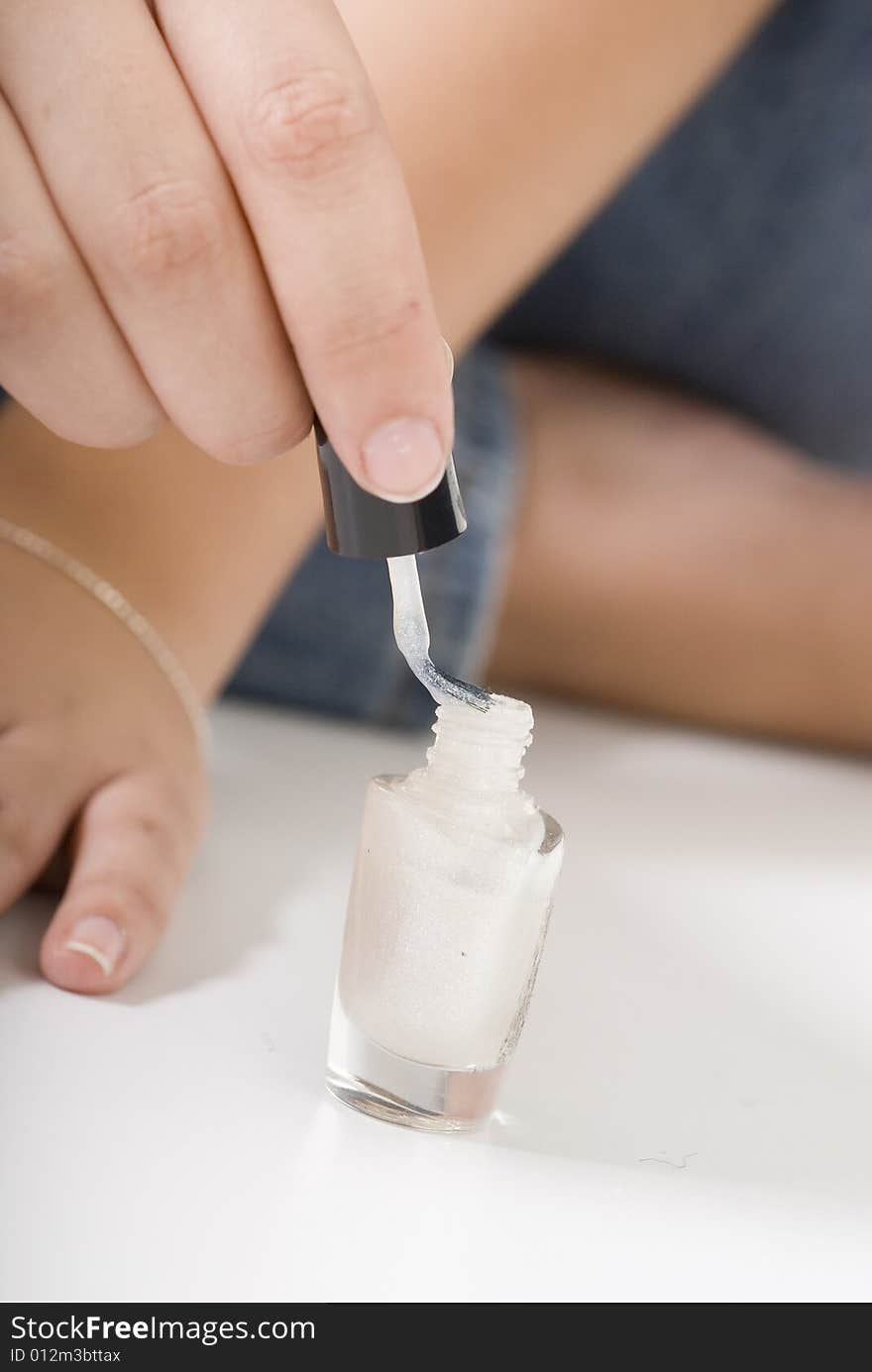 White nail polish in small bottle. White nail polish in small bottle