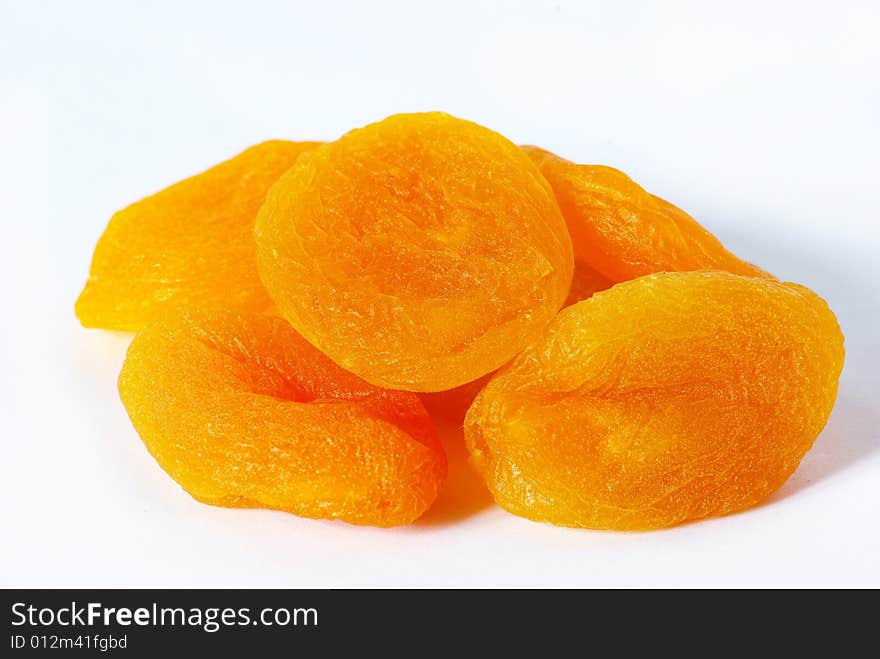 Dried apricot fruits isolated over white background