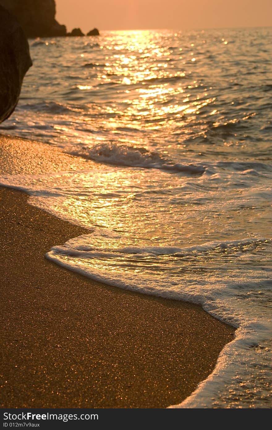 Sunset over sand sea coast. Sunset over sand sea coast