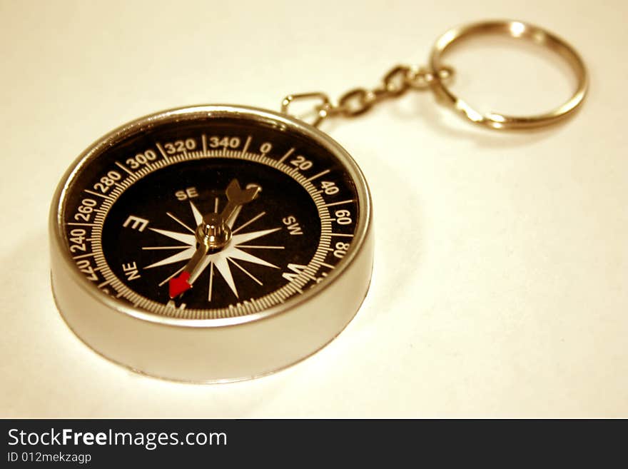 Black compass isolated on a white background