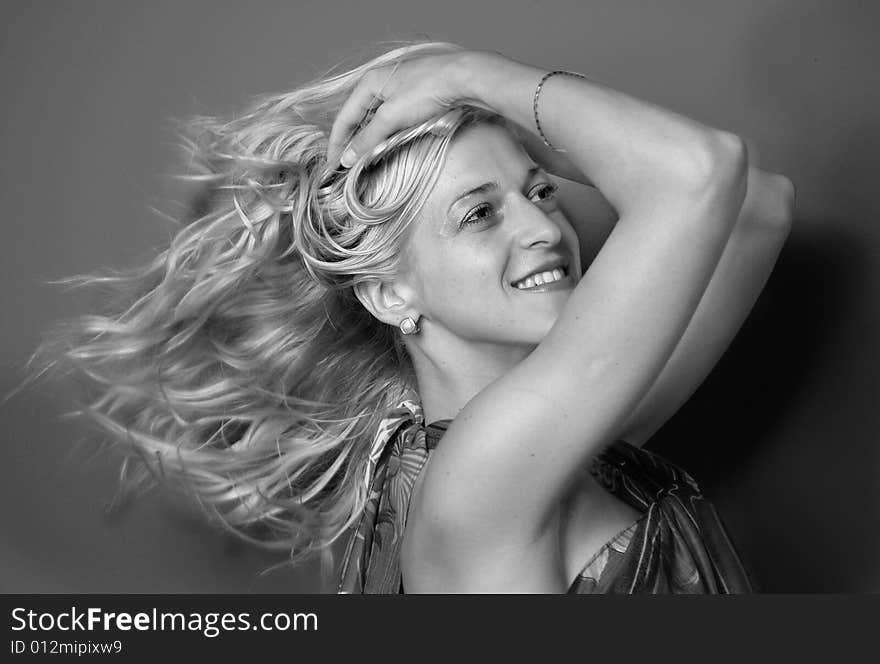 Picture of a active woman with the hair in the wind. Picture of a active woman with the hair in the wind