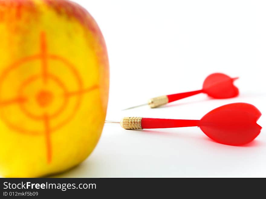 Yellow Apple with Darts closeup on White Background