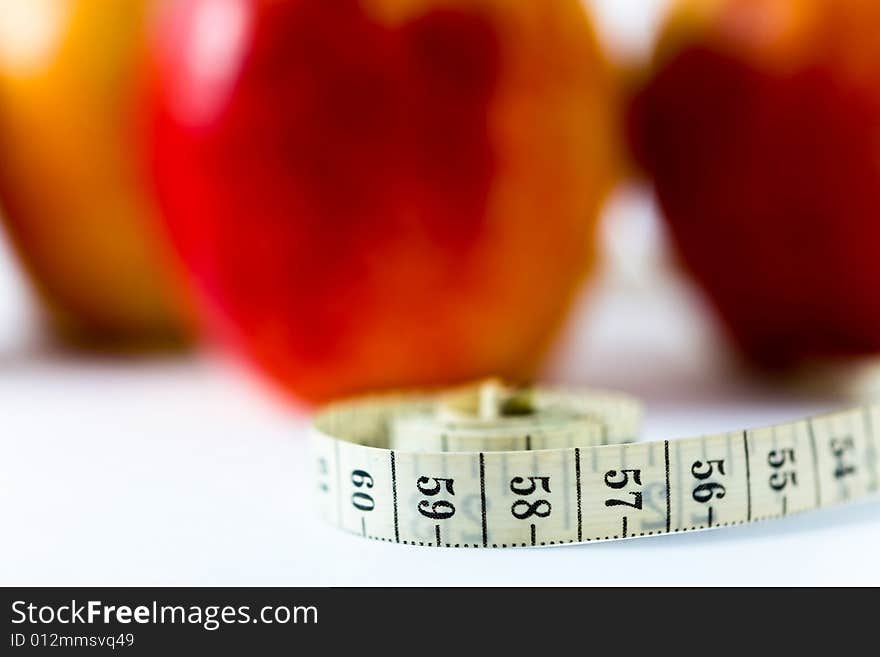 An image of tape on background of red apple