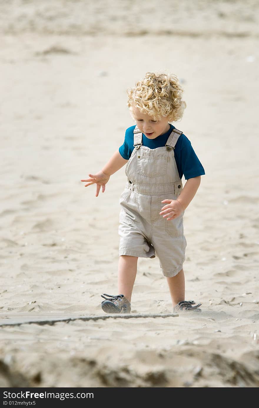 Boy At The Beach