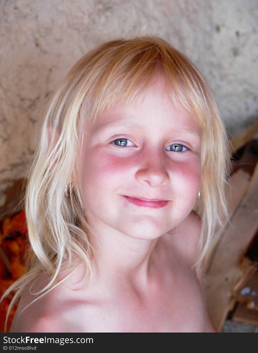 Beautiful little girl with blue eyes and blonde hair. Beautiful little girl with blue eyes and blonde hair.