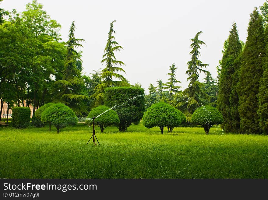 Grass watering in Beijing World park.