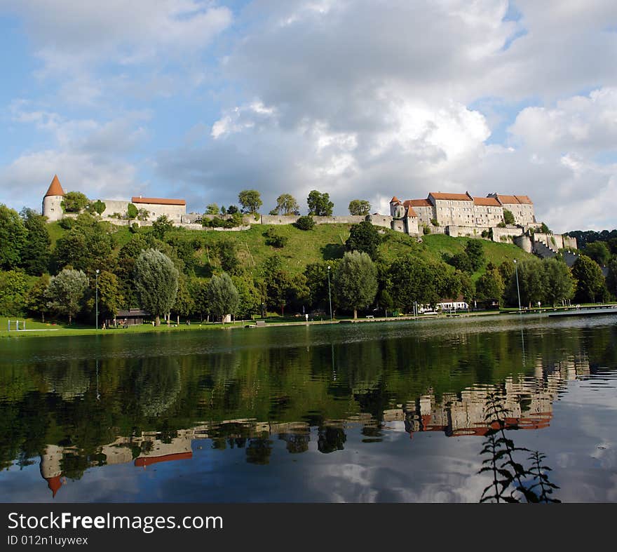 Old Castle and Clouds is reflected in the lake .
Burghausen City, Bavaria ,  Germany . Old Castle and Clouds is reflected in the lake .
Burghausen City, Bavaria ,  Germany .