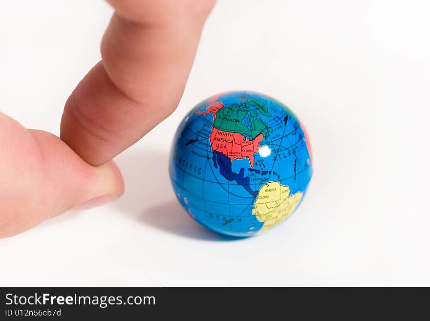 Fingers Ready To Push A Globe