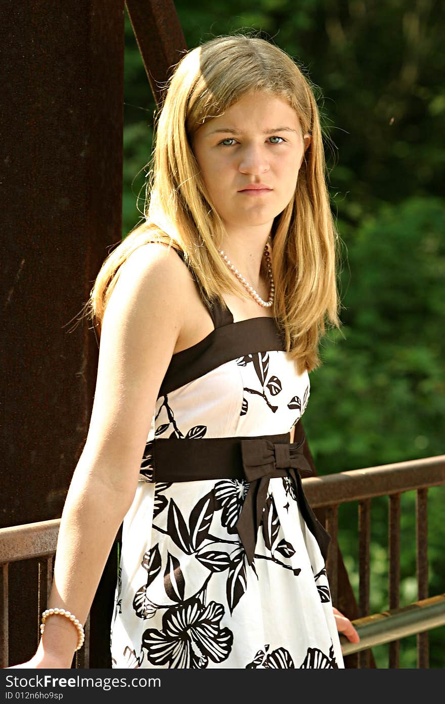 Teen wearing a beautiful dress outside. Teen wearing a beautiful dress outside